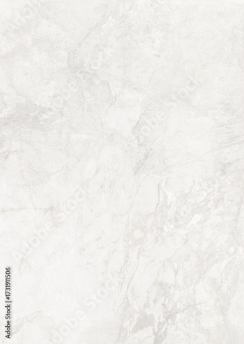 Close-up of white marble surface with subtle gray veining and natural texture