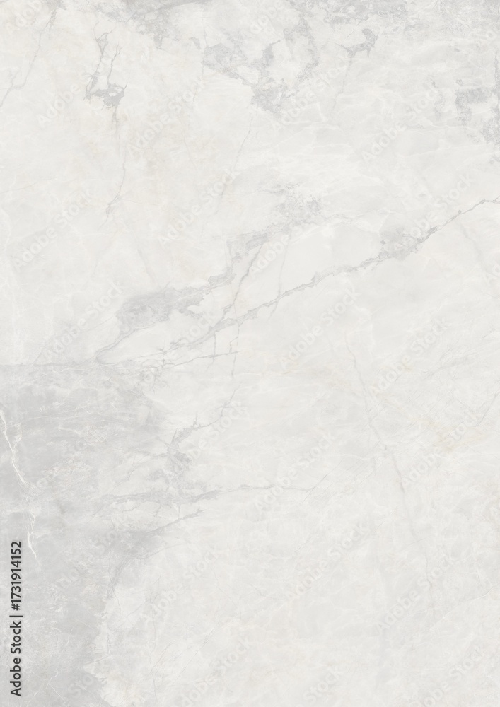 Naklejka premium Close-up view of light gray marble surface with natural veining patterns