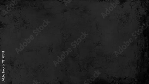 Dark grey textured concrete wall background. 