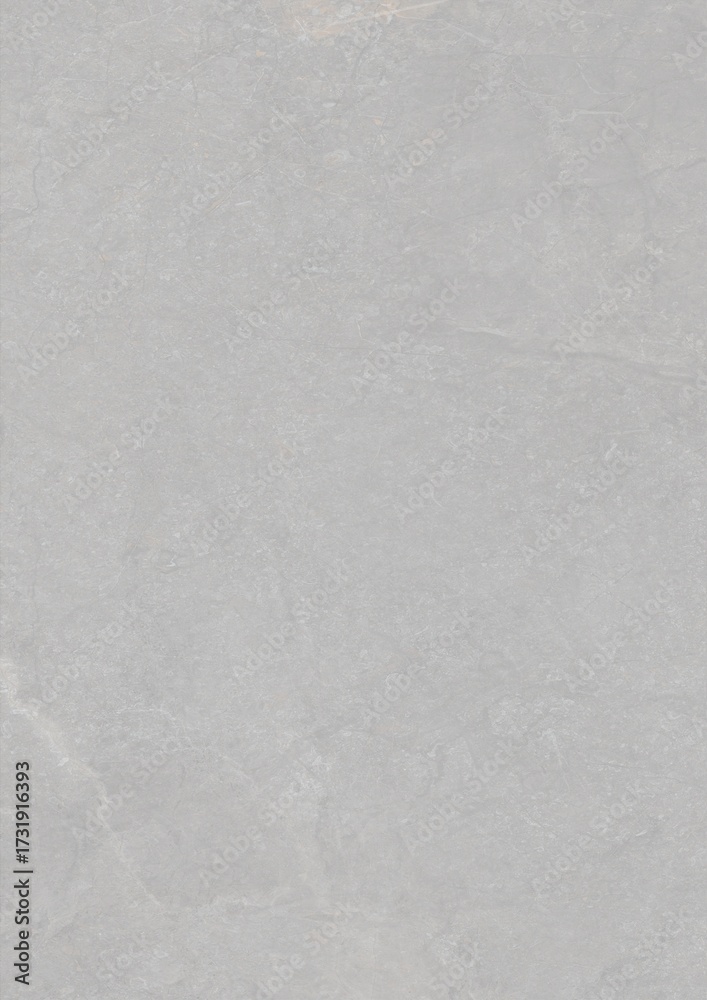 Naklejka premium Close-up view of a smooth, light gray textured surface with subtle variations in tone and faint markings.