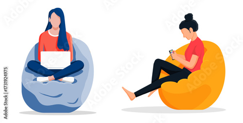 Woman using laptop on beanbag and another woman using smartphone. Remote work and relaxing with digital device at home.