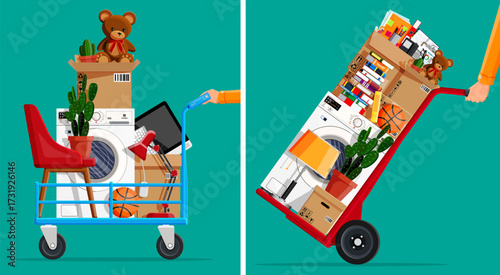 Man moving home furniture and boxes on push cart. Delivery service and business, relocation or moving day concept.