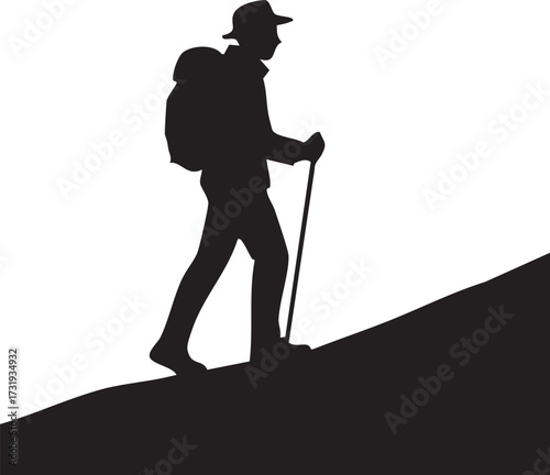 Silhouette of a lone hiker on a ridge