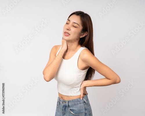 Asian woman has problem with structural posture She had neck and shoulder pain. She massaged her neck and shoulders for relief. reduce muscle tension. Unwell unhealthy on isolated white background