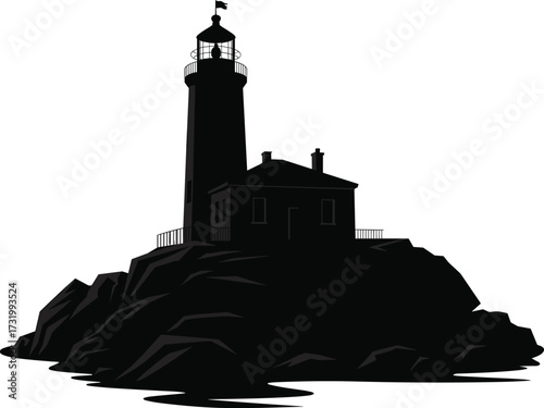 Silhouette of a lighthouse on a rocky island with a small building coast