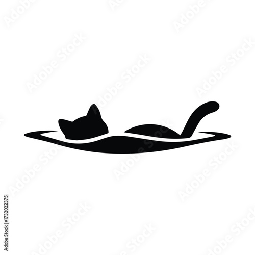 Playful black cat lying on its back in a relaxed pose silhouette