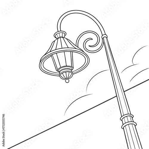 Classic vintage street lamp with ornate scrollwork and decorative finial against a simple sky background with clouds