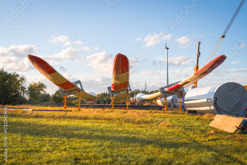 Three propellers ready for assembly at the wind turbine construction site