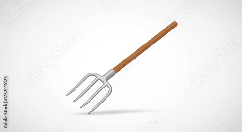Isolated vintage hay fork on a white background for farming tools concept