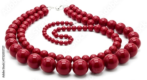 Elegant red beaded necklace and bracelet set isolated on white background