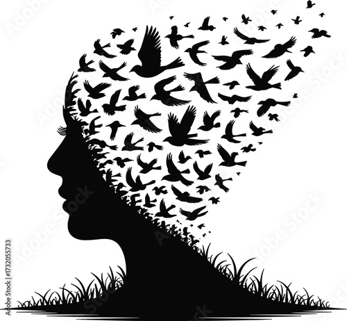 Silhouette of a woman s head transforming into a flock of birds