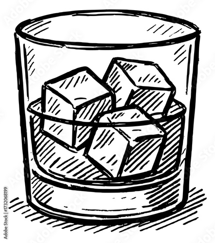Whiskey glass with ice cubes
