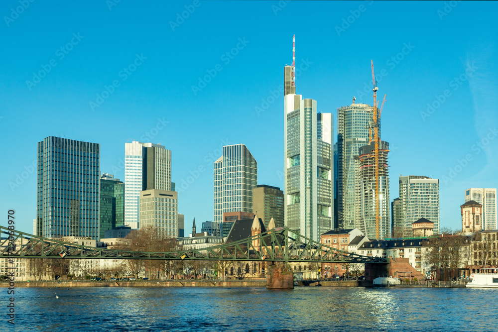 custom made wallpaper toronto digitalskyline of Frankfurt am Main seen from iron footbridge crossing river Main