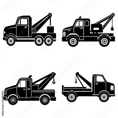 Illustration of four black tow trucks with different designs and orientations on a white background image