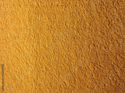 The textured surface is brown, red in color as a background. Felt. High quality photo
