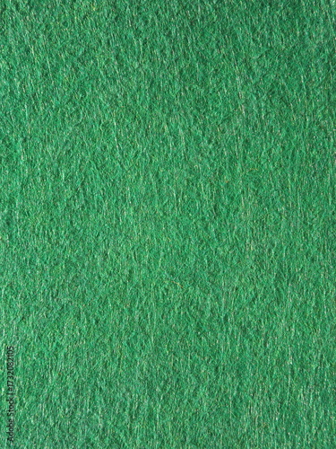 The textured surface is green, light green, pistachio color, herbal color as a background. Felt. High quality photo