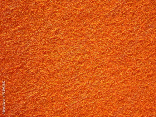 Orange background with structured surface imitation felt. High quality photo