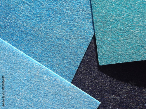 The textured surface is blue as a background. Felt. High quality photo