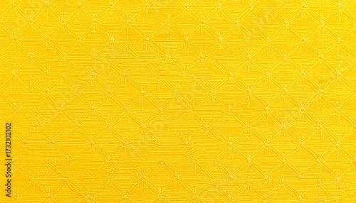 Bright yellow fabric with intricate diamond pattern