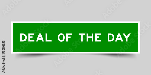 Green color square shape sticker label with word deal of the day on gray background