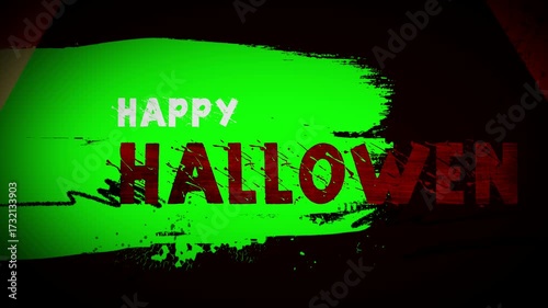 Scary glowing jackolantern with a hand lighting it up on a dark background, halloween concept