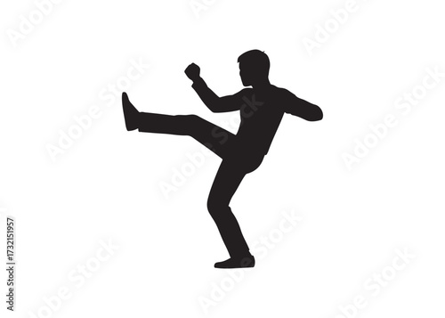 Silhouette of a man kicking isolated on white background