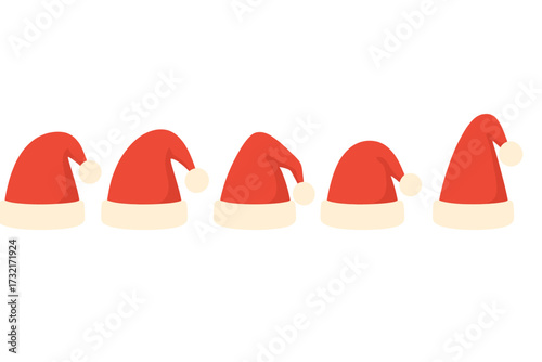 Assortment of classic red Santa Claus hats with fluffy white pom-poms and trim for festive Christmas holiday season