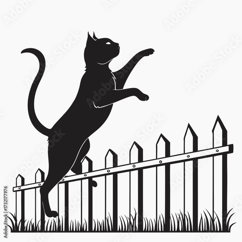 A black cat jumps over a white picket fence