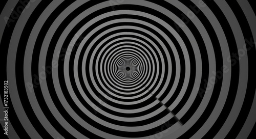 Mesmerizing black and white concentric circles create a hypnotic optical illusion for abstract backgrounds.