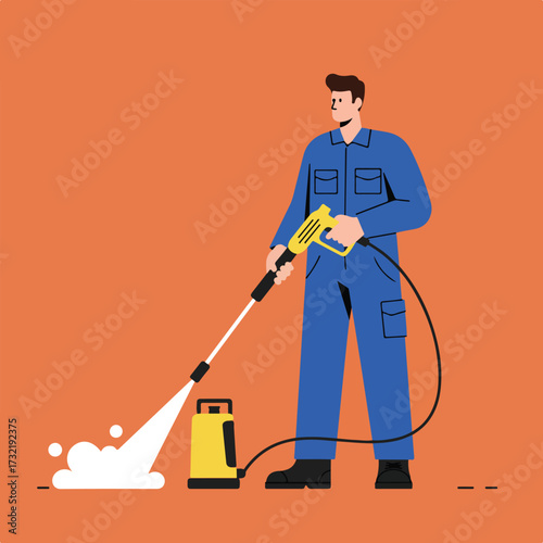 Man in blue coveralls using yellow pressure washer with foam on orange background