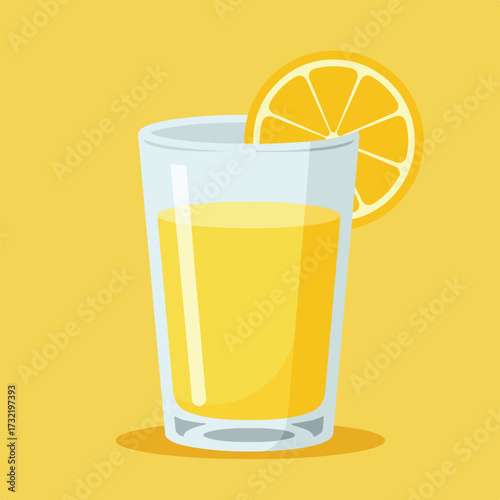 Refreshing glass of juice with an orange slice on a bright yellow backdrop