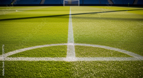 Pristine Green Soccer Field Corner with Goal and Stadium Seating in Soft Focus