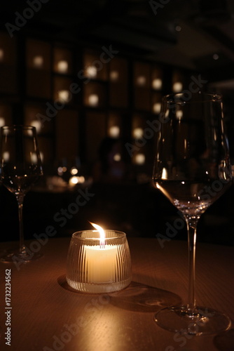 Wallpaper Mural Romantic candlelight on restaurant table with wine glasses in warm cozy ambiance Torontodigital.ca