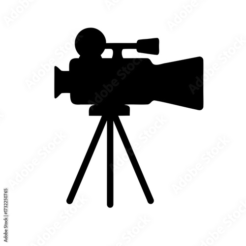 Silhouette of a professional video camera on a tripod for film industry