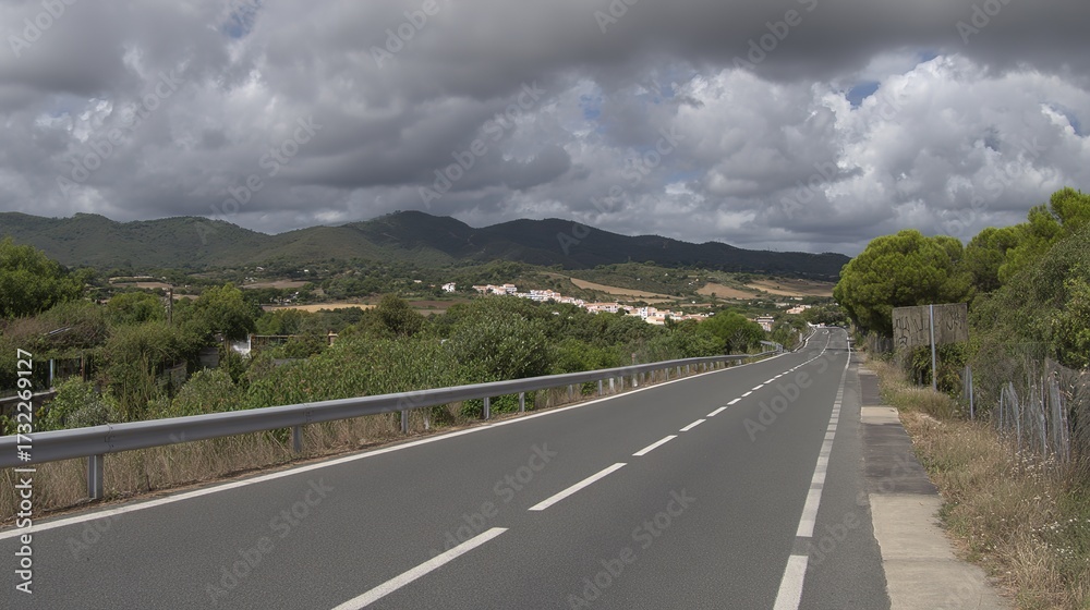 Fototapeta premium asphalt. Panoramic view of an empty road under cloudy skies, capturing a serene and open landscape. travel magazines, destination branding, designed for outdoor magazines and nature guides.