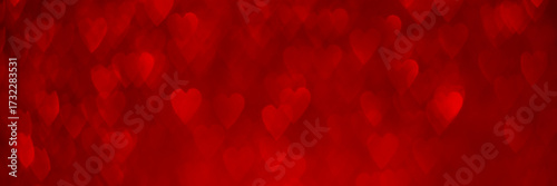 Red hearts, sparkling glitter bokeh background banner, valentines day abstract defocused texture header.
