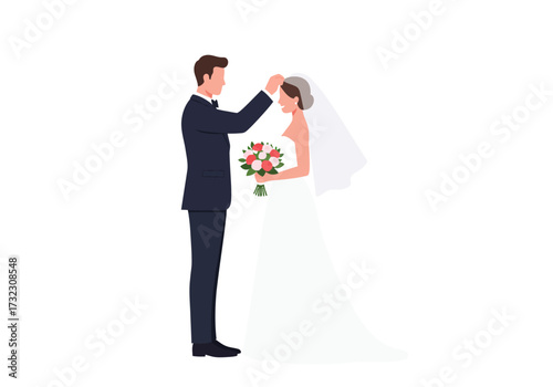 A bride in a white gown holds a bouquet as a groom in a suit adjusts her veil