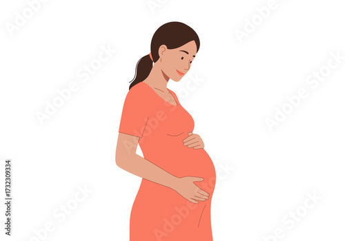 A pregnant woman in a coral dress holds her belly smiling