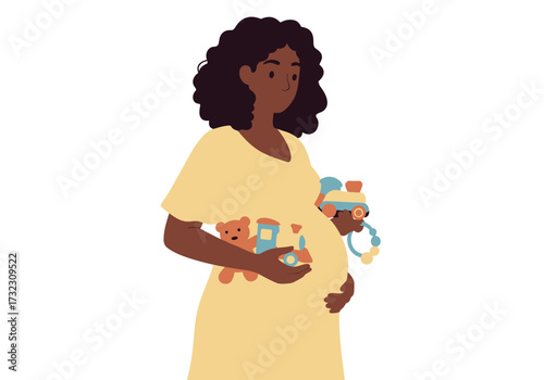 A pregnant woman with dark skin holds baby toys against her belly in a yellow dress