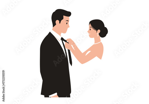 Couple Groom in suit bride adjusts tie elegant