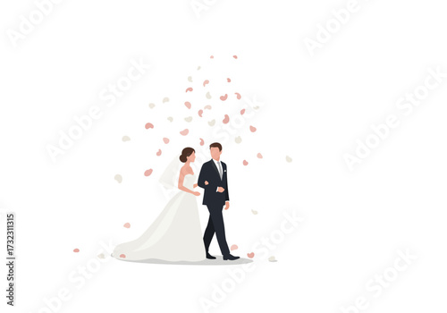 Newlyweds walk amid falling petals