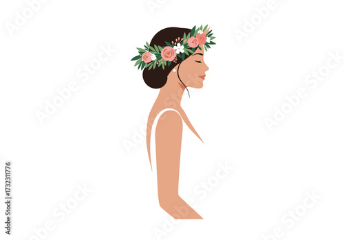 Profile of a brunette bride in a white dress wearing a floral crown