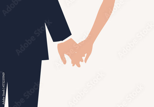 Two people in wedding attire holding hands