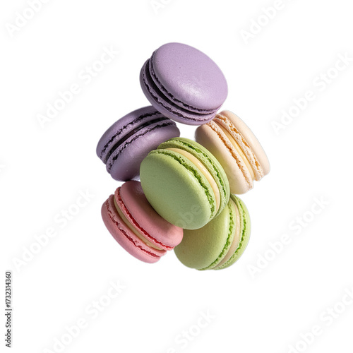 Various colorful of macarons floating on the air isolated on white background