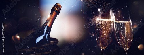 Canvas Print Festive lights and champagne in glasses for toasting