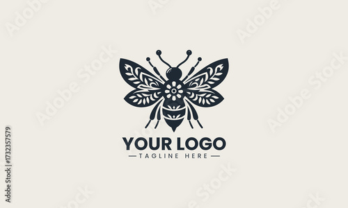Decorative black silhouette of an elegant honey bee featuring beautiful floral and leafy ornamental vector design