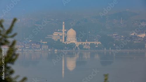 White marble glows by Dal’s gentle waves — serenity at Hazratbal.