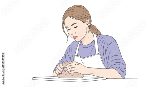 Focused young woman shaping clay with her hands wearing an apron, a serene and creative moment for pottery enthusiasts and artful brand storytelling