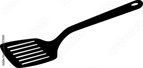 Black silhouette of a slotted spatula kitchen utensil isolated on white background