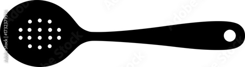 Black silhouette of a slotted kitchen spoon with a hole in the handle isolated on white background
